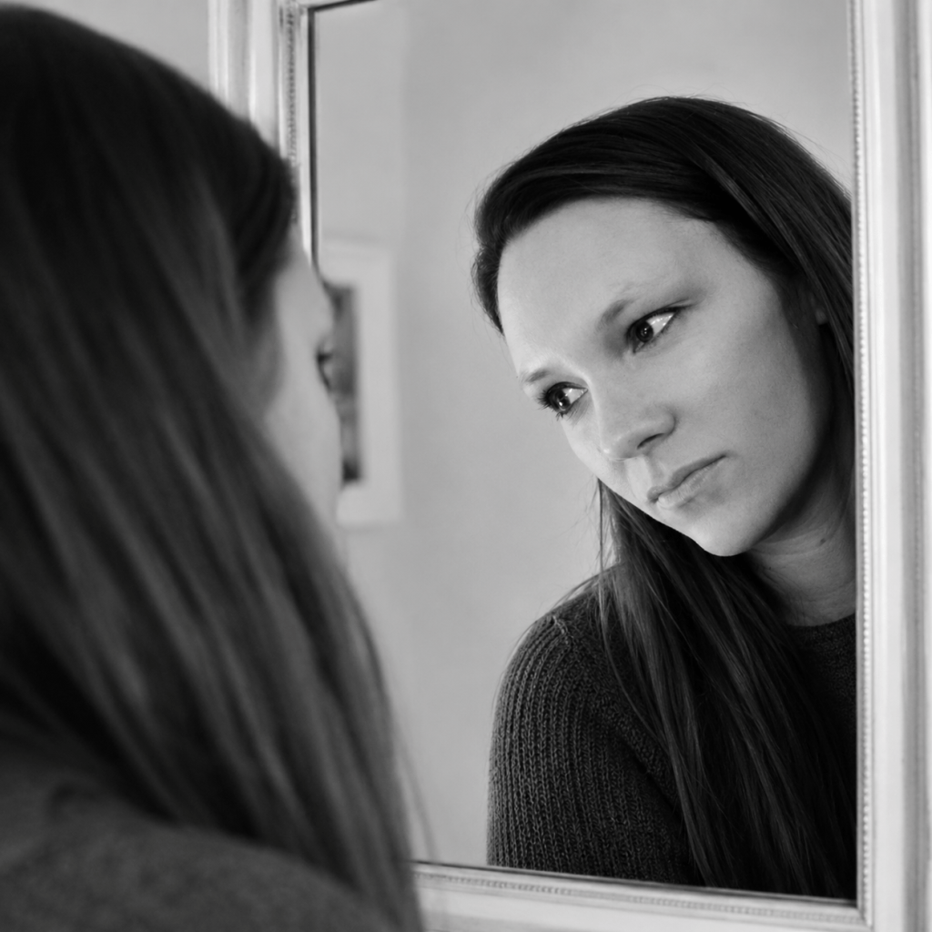 Me staring into the mirror, deep in thought