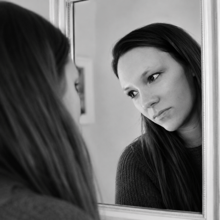 Me staring into the mirror, deep in thought
